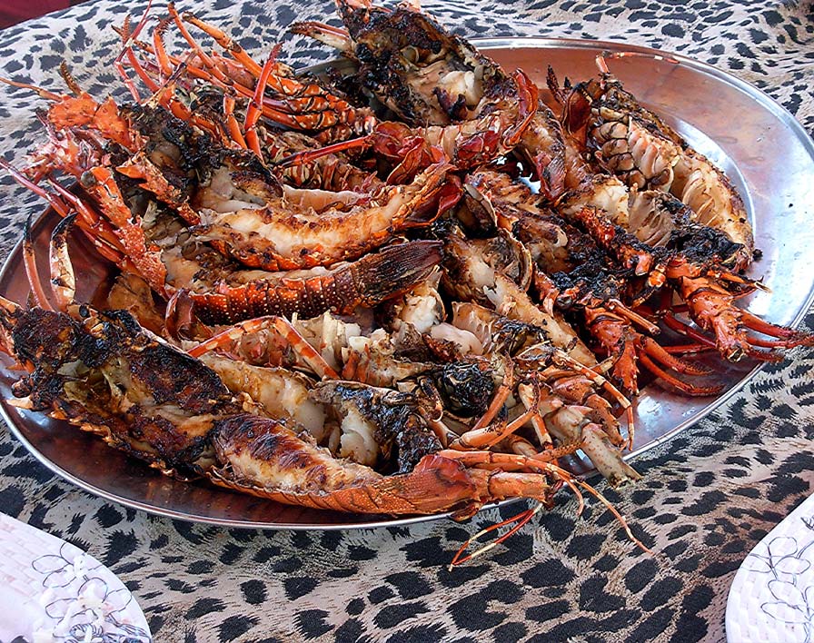 Pranzo a base di aragosta e gamberi alla griglia Sardegna Due